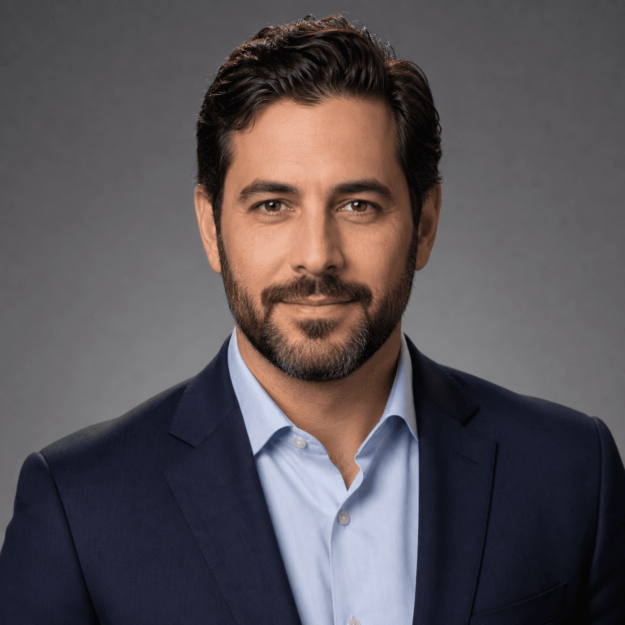 Professional corporate headshot - man in navy suit